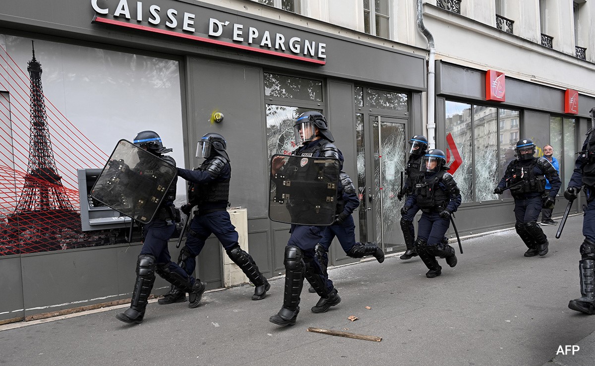 Police Car, Bank Attacked As Tensions Erupt At Anti-Cop Protest In Paris